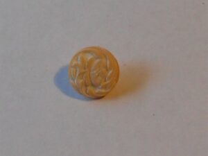 Mönstrad knapp 624 blekgul/naturvit