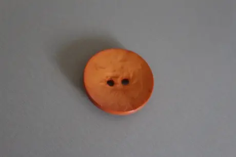 Bränd orange färgad knapp 45 mm