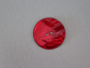 Knapp 34 mm mörkröd