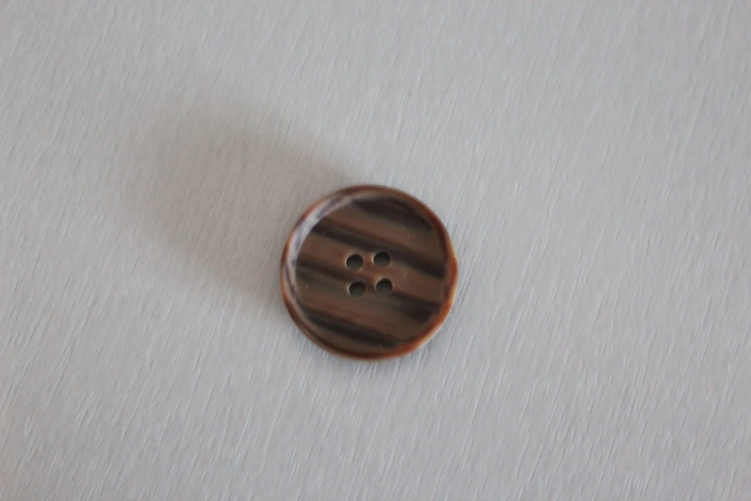 Knapp 25 mm brun